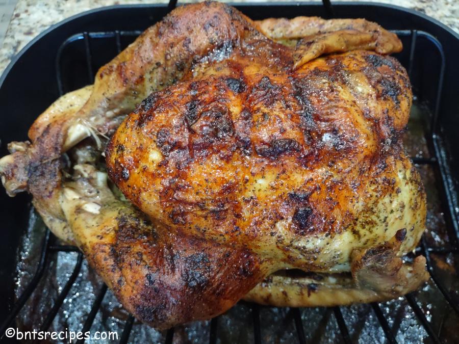 aerial view of brined and roasted whole turkey on v-rack