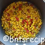 aerial view of frozen fried skillet corn with bell peppers and onions