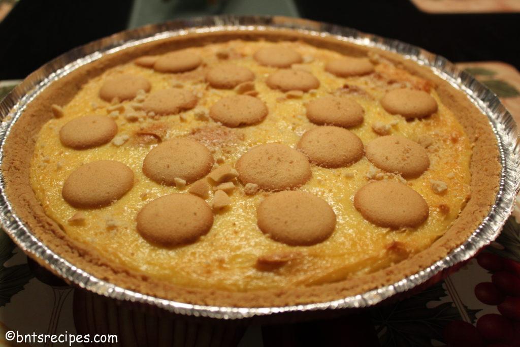 banana pudding cheesecake with graham cracker crust and vanilla wafers