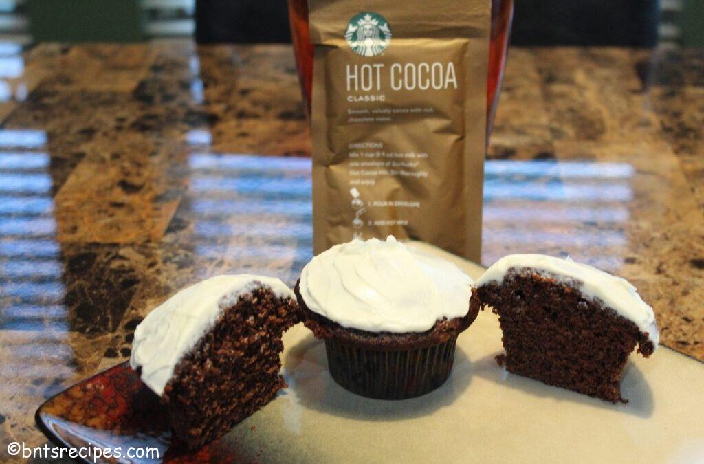 hot cocoa cupcakes cut in half inspired by the Starbucks hot cocoa pack