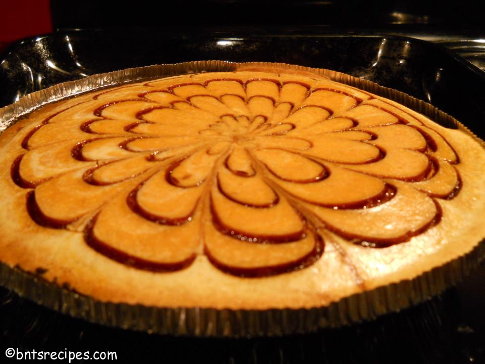 close-up of whole pumpkin spiderweb cheesecake