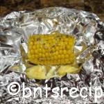 foil-wrapped frozen corn on the cob