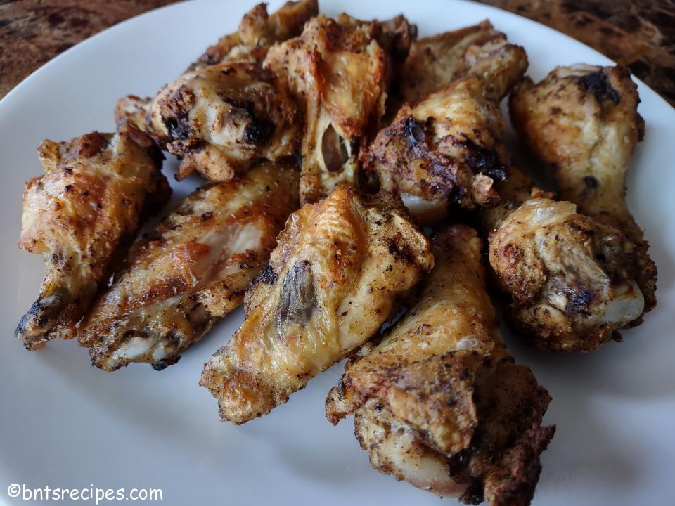 close-up of oven fried chicken wings plated