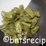 aerial view of sauteed italian green beans in a black and white abstract bamboo bowl